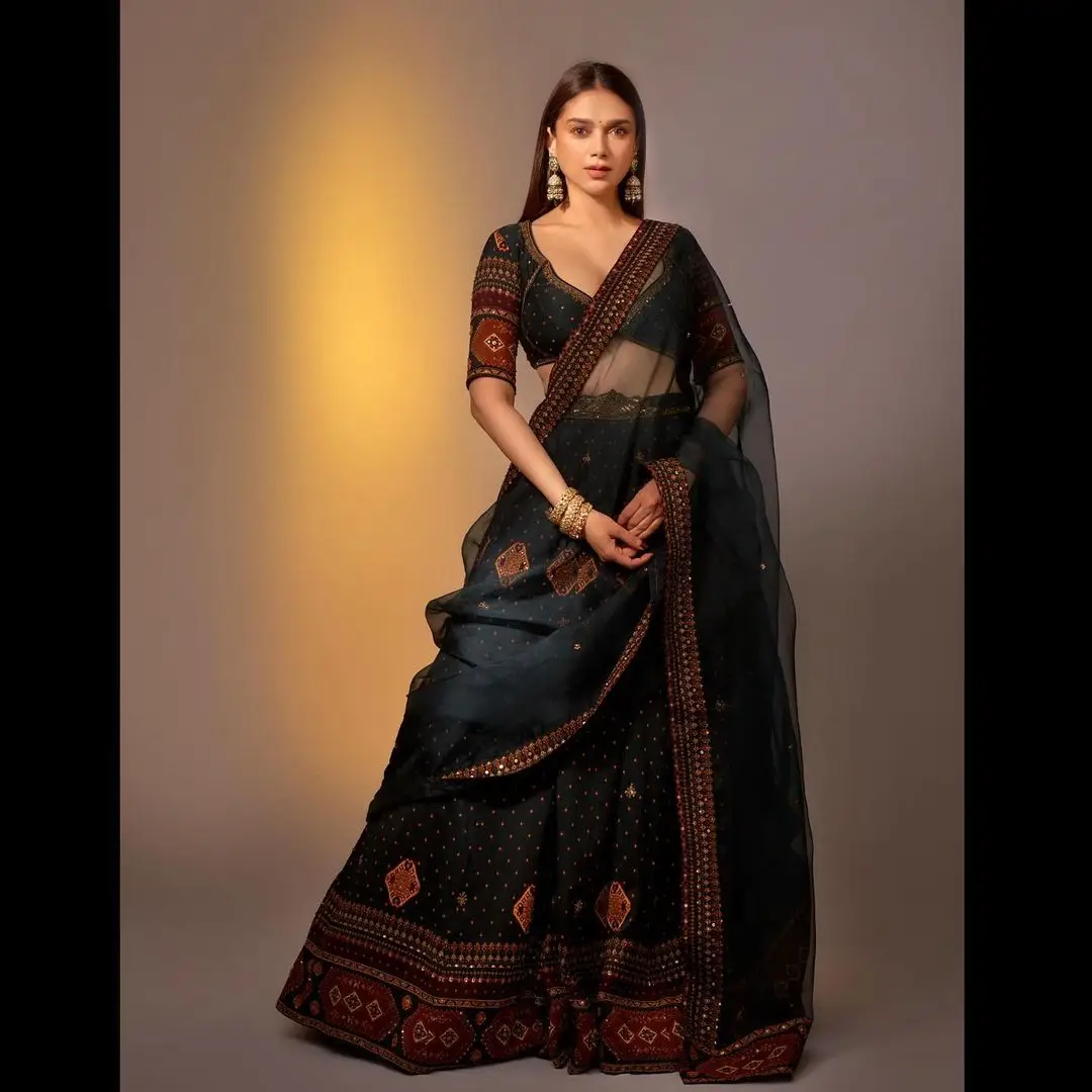 Bollywood Actress Aditi Rao Hydari In Maroon Lehenga Choli